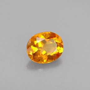 Clinohumite Jaune orange naturelle Coupe ovale, 0.41 ct, VS