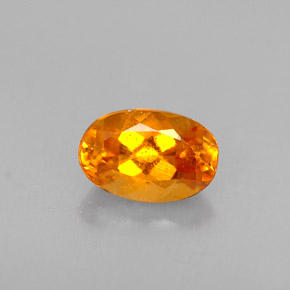 Clinohumite orange naturelle coupe ovale, 0,47 ct, VS-SI