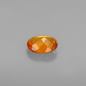 Clinohumite Jaune orange naturelle Coupe ovale, 0.54 ct, VS