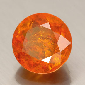 Clinohumite Jaune orange naturelle Coupe roude, 3.12 ct, SI
