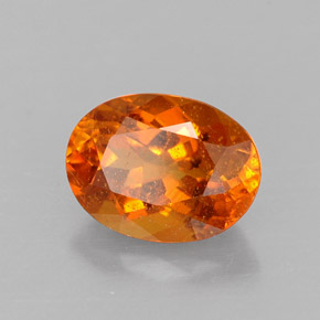 Clinohumite Jaune orange naturelle Coupe ovale, 1.43 ct, SI