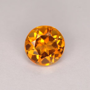 Clinohumite Jaune orange naturelle Coupe roude, 0.71 ct, VS