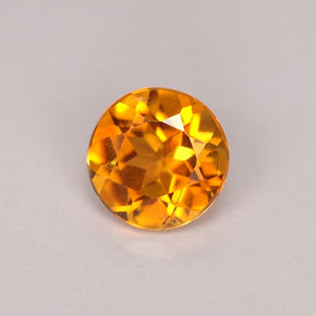 Clinohumite Jaune orange naturelle Coupe roude, 0.71 ct, VS