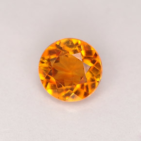 Clinohumite orange jaunâtre naturelle coupe roude, 0,68 ct, VS-SI