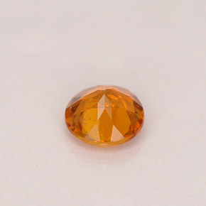 Clinohumite orange naturelle coupe roude, 0,46 ct, SI