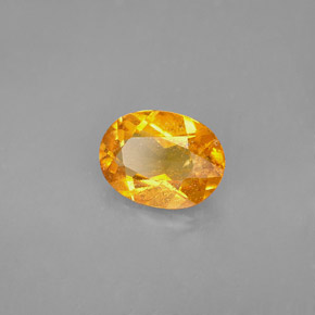 Clinohumite orange naturelle coupe ovale, 1,68 ct, VS-SI