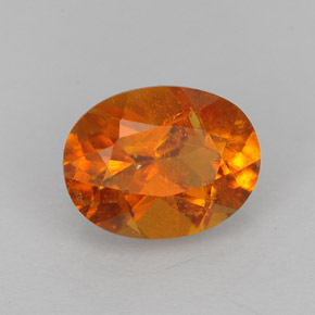 Clinohumite orange naturelle coupe ovale, 1,43 ct, VS-SI