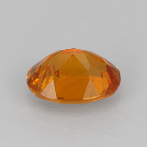 Clinohumite orange naturelle coupe ovale, 1,43 ct, VS-SI