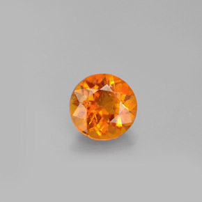 Clinohumite orange naturelle coupe roude, 0,77 ct, VS-SI