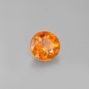 Clinohumite orange naturelle coupe roude, 0,77 ct, VS-SI