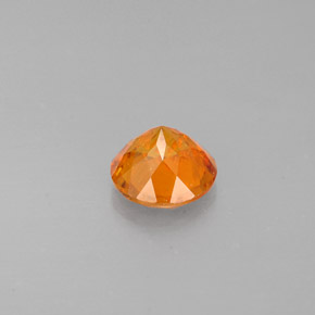 Clinohumite orange naturelle coupe roude, 0,77 ct, VS-SI