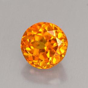 Clinohumite Jaune orange naturelle Coupe roude, 0.89 ct, VS-SI