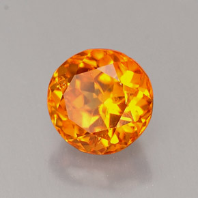 Clinohumite Jaune orange naturelle Coupe roude, 0.89 ct, VS-SI