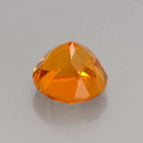 Clinohumite Jaune orange naturelle Coupe roude, 0.89 ct, VS-SI