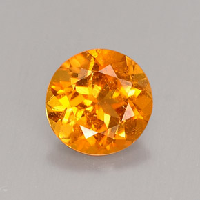 Clinohumite orange naturelle coupe roude, 0,62 ct, VS-SI