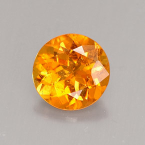 Clinohumite orange naturelle coupe roude, 0,62 ct, VS-SI