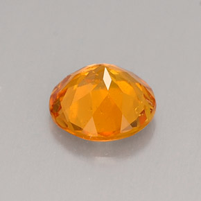 Clinohumite orange naturelle coupe roude, 0,62 ct, VS-SI