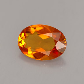 Clinohumite orange naturelle coupe ovale, 1,23 ct, VS