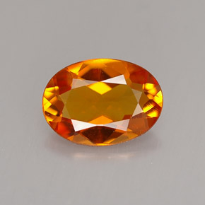 Clinohumite orange naturelle coupe ovale, 1,23 ct, VS