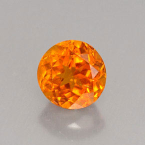 Clinohumite Jaune orange naturelle Coupe roude, 0.80 ct, VS-SI