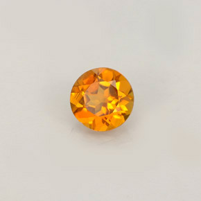 Clinohumite orange jaunâtre naturelle coupe roude, 0,52 ct, VS
