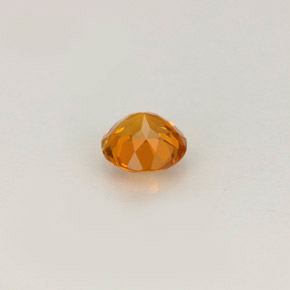 Clinohumite orange jaunâtre naturelle coupe roude, 0,46 ct, VS