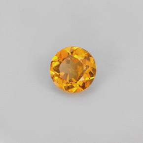 Clinohumite orange naturelle coupe roude, 0,59 ct, VS-SI