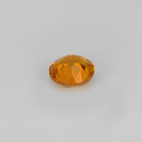 Clinohumite orange naturelle coupe roude, 0,59 ct, VS-SI