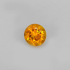 Clinohumite Jaune orange naturelle Coupe roude, 0.60 ct, VS-SI