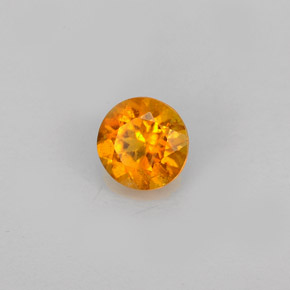 Clinohumite Jaune orange naturelle Coupe roude, 0.60 ct, VS-SI