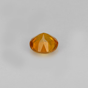 Clinohumite Jaune orange naturelle Coupe roude, 0.60 ct, VS-SI