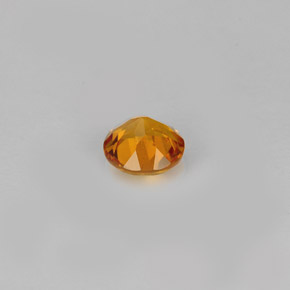 Clinohumite Jaune orange naturelle Coupe roude, 0.39 ct, VS-SI