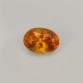 Clinohumite orange naturelle coupe ovale, 0,93 ct, VS-SI