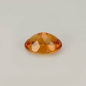 Clinohumite orange naturelle coupe ovale, 0,93 ct, VS-SI