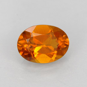 Clinohumite Jaune orange naturelle Coupe ovale, 0.84 ct, VS-SI