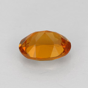 Clinohumite Jaune orange naturelle Coupe ovale, 0.84 ct, VS-SI