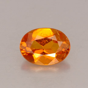 Clinohumite orange naturelle coupe ovale, 0,53 ct, VS