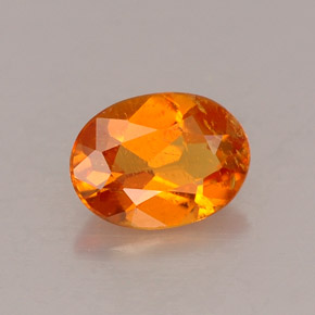 Clinohumite orange naturelle coupe ovale, 0,53 ct, VS