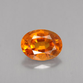 Clinohumite Jaune orange naturelle Coupe ovale, 1.47 ct, VS-SI