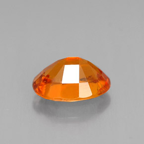 Clinohumite Jaune orange naturelle Coupe ovale, 1.47 ct, VS-SI