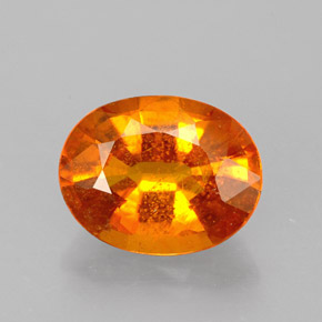 Clinohumite Jaune orange naturelle Coupe ovale, 1.46 ct, VS-SI