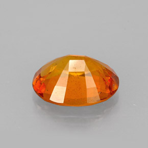 Clinohumite Jaune orange naturelle Coupe ovale, 1.46 ct, VS-SI