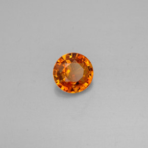 Clinohumite Jaune orange naturelle Coupe roude, 0.63 ct, VS-SI