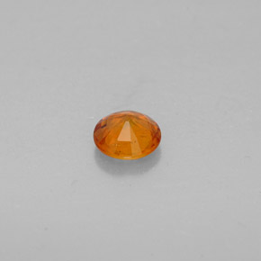 Clinohumite Jaune orange naturelle Coupe roude, 0.63 ct, VS-SI