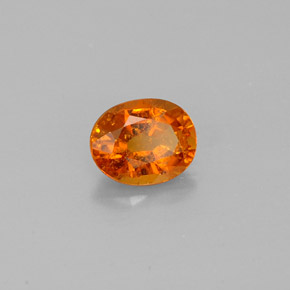 Clinohumite orange naturelle coupe ovale, 0,92 ct, SI