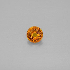 Clinohumite orange naturelle coupe roude, 0,48 ct, SI