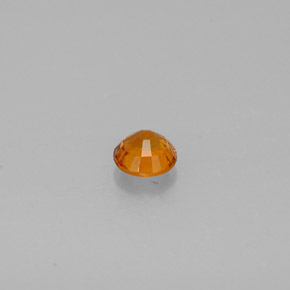 Clinohumite orange naturelle coupe roude, 0,48 ct, SI