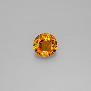 Clinohumite orange naturelle coupe roude, 0,57 ct, SI