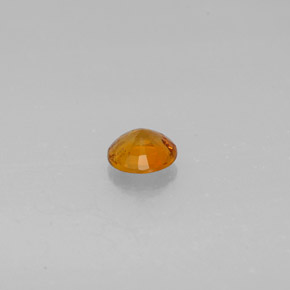 Clinohumite orange naturelle coupe roude, 0,57 ct, SI