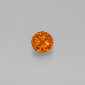 Clinohumite Jaune orange naturelle Coupe roude, 0.64 ct, SI